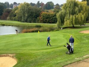 Three players at Westerham Golf Club in competition
